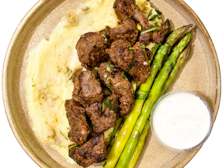 14 - Garlic Butter Steak Tips with Mashed Potatoes, Asparagus & Garlic Cream (GF) For Sale